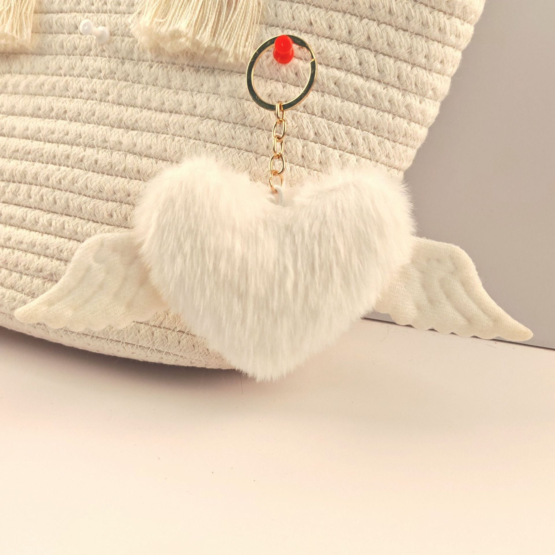 Wholesale Heart wings fur ball keychain